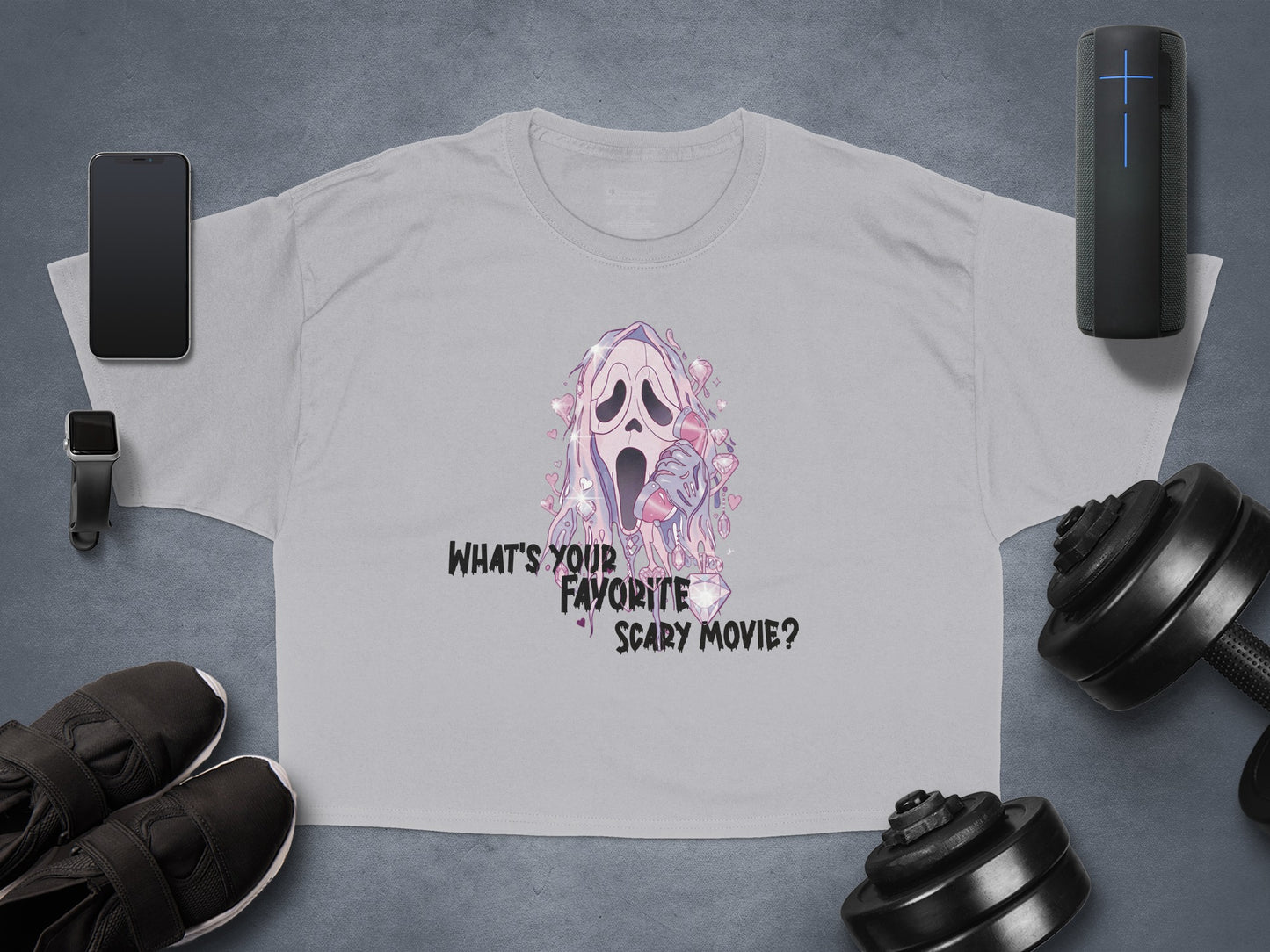 Gray t-shirt with ghost graphic and "What's Your Favorite Scary Movie?" text.