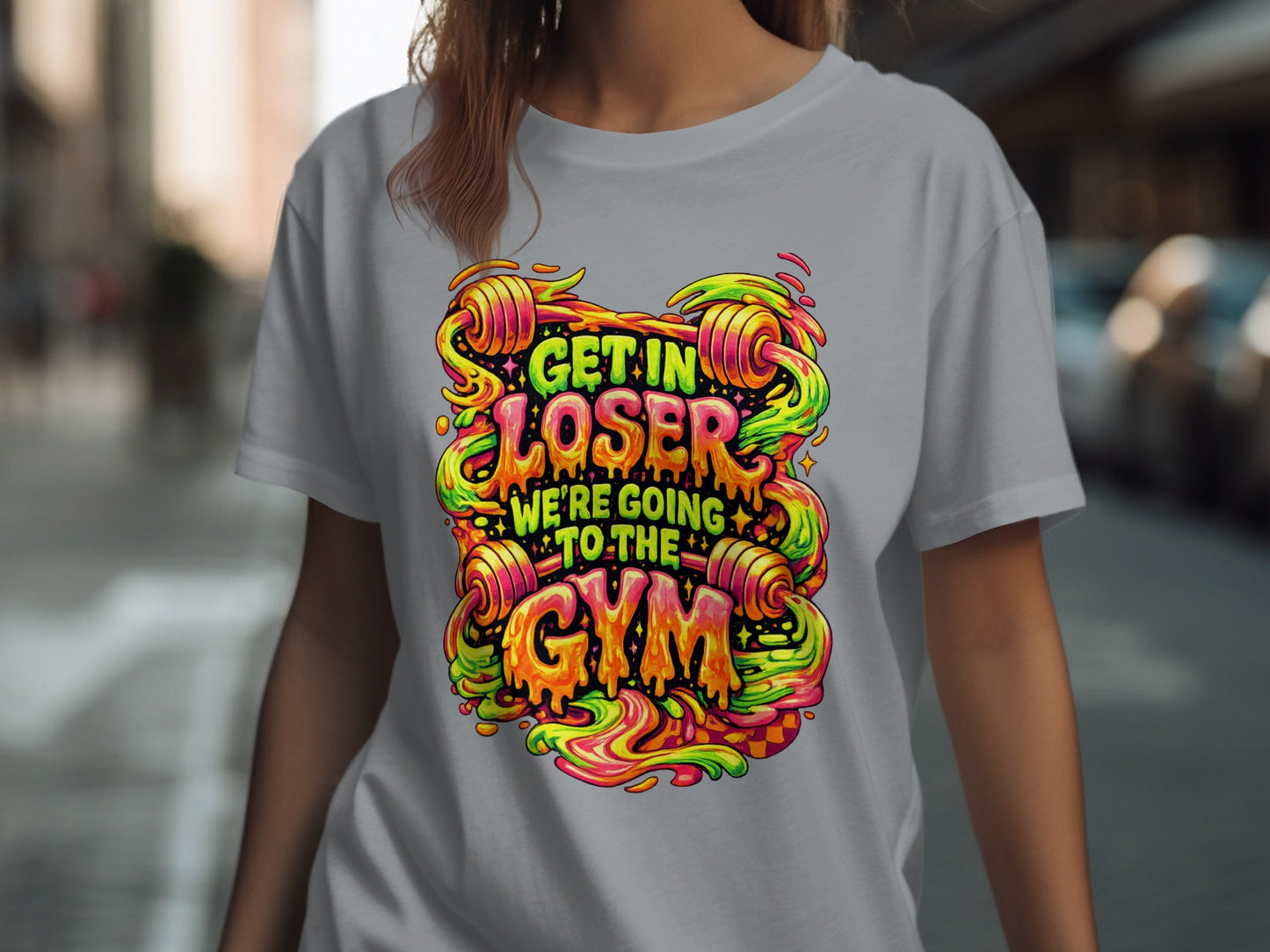 T-shirt with "Get in loser, we're going to the gym" text.