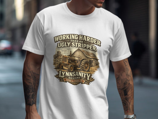 White t-shirt with "Working Harder Than An Ugly Stripper" and farm illustration.