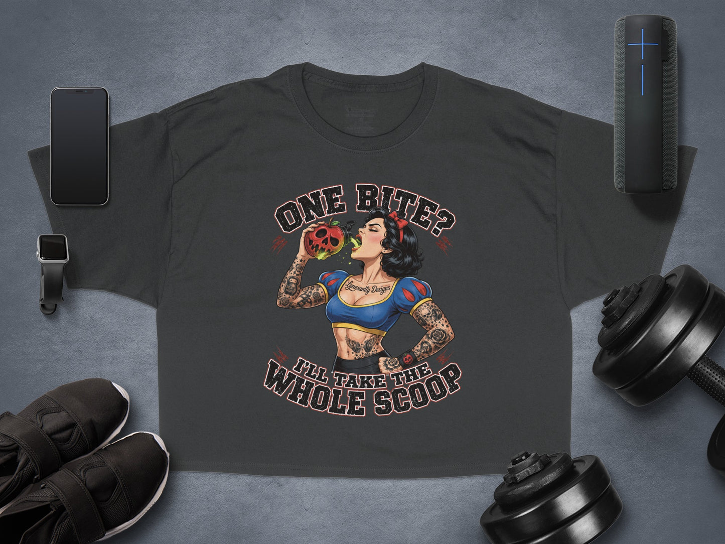 T-shirt with Snow White graphic, holding an apple, text "ONE BITE, I'LL TAKE THE WHOLE SCOOP".