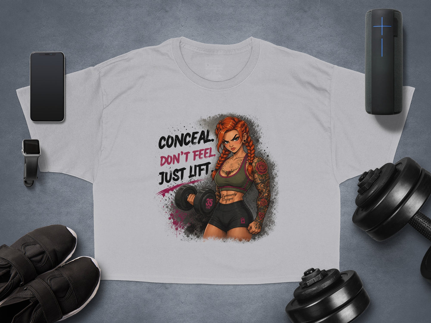 Grey cropped t-shirt with "CONCEAL DON'T JUST LIFT" and muscular woman illustration.