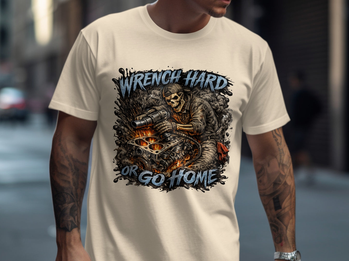 Skeleton mechanic working on engine with text "Wrench Hard or Go Home".