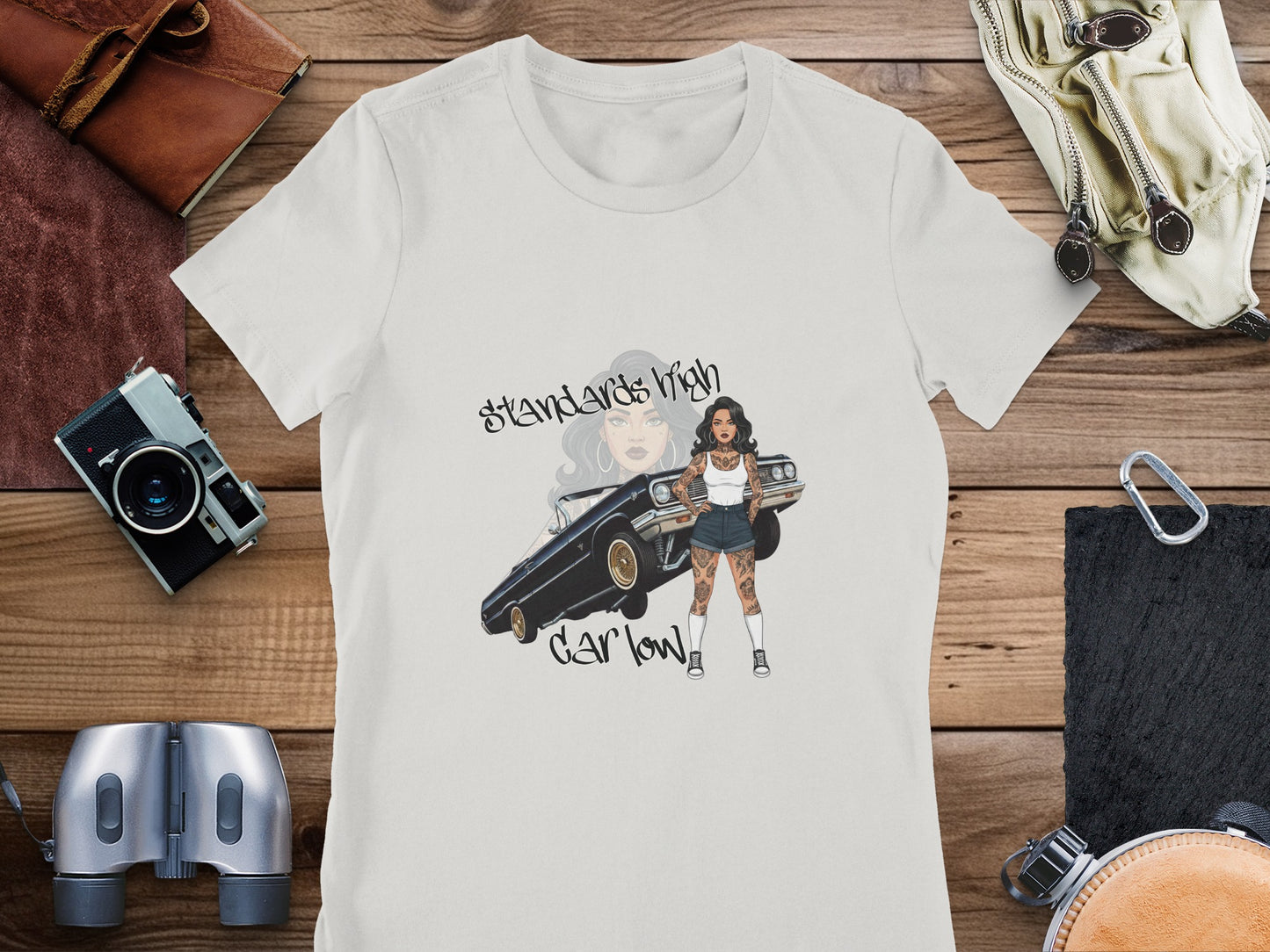 T-shirt with tattoo artwork of woman and vintage car, text "Standards High Car Low".