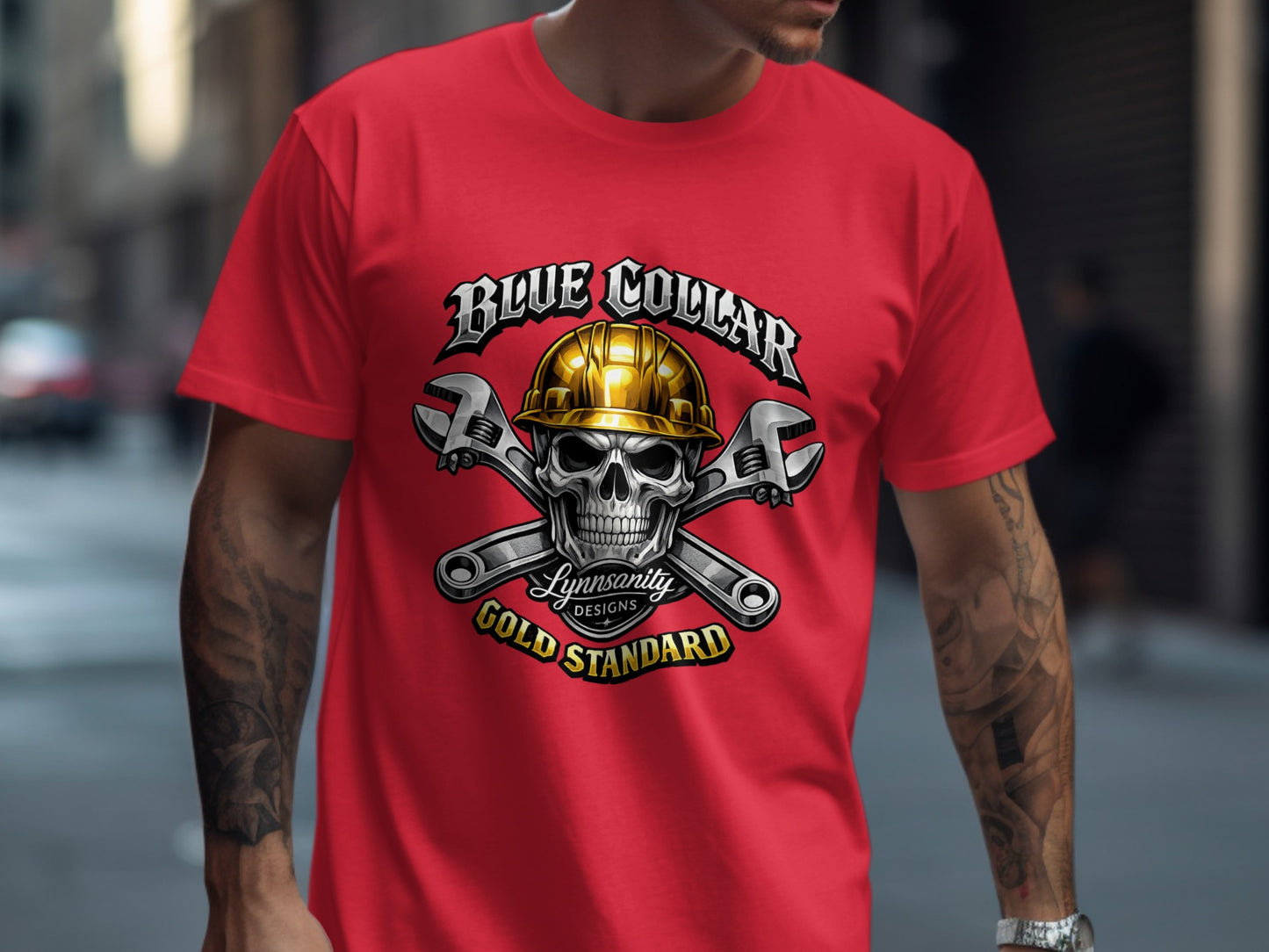 Skull with wrenches and helmet on red t-shirt, "Blue Collar Gold Standard".