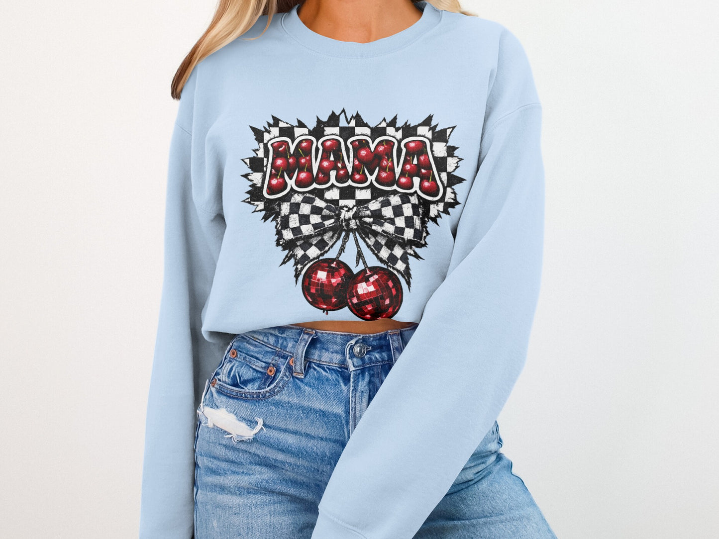 Light blue sweatshirt with "MAMA" text, checkered pattern, and hanging cherries.