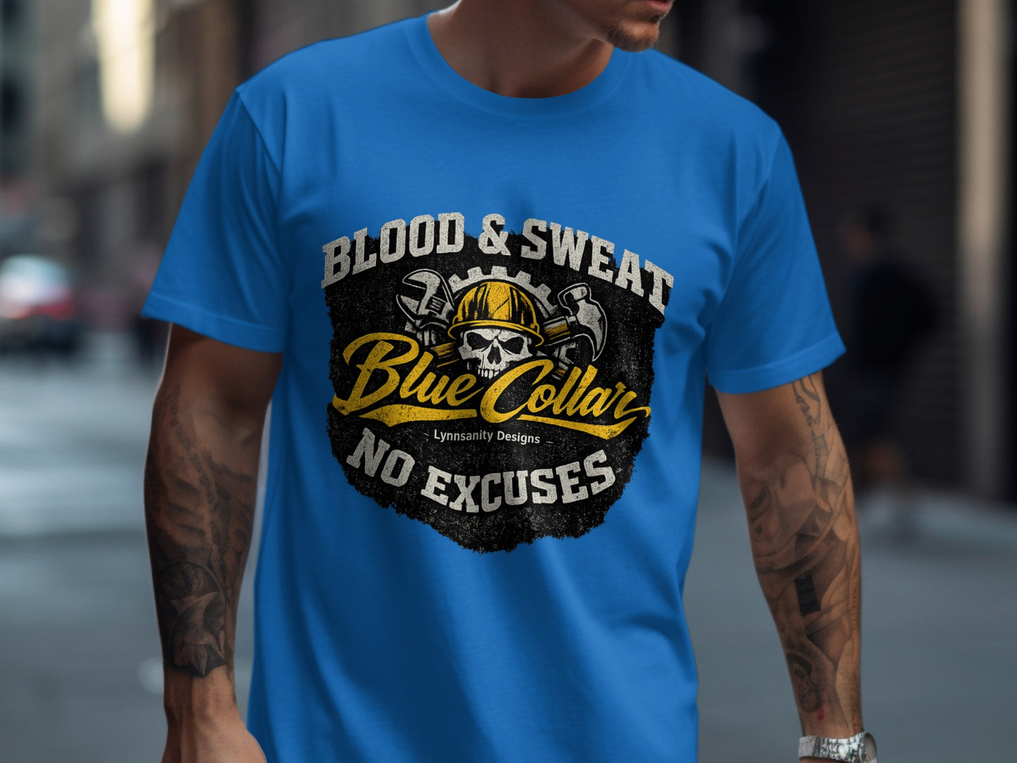 Blue t-shirt with "Blood & Sweat, Blue Collar, No Excuses" text and skull graphic.