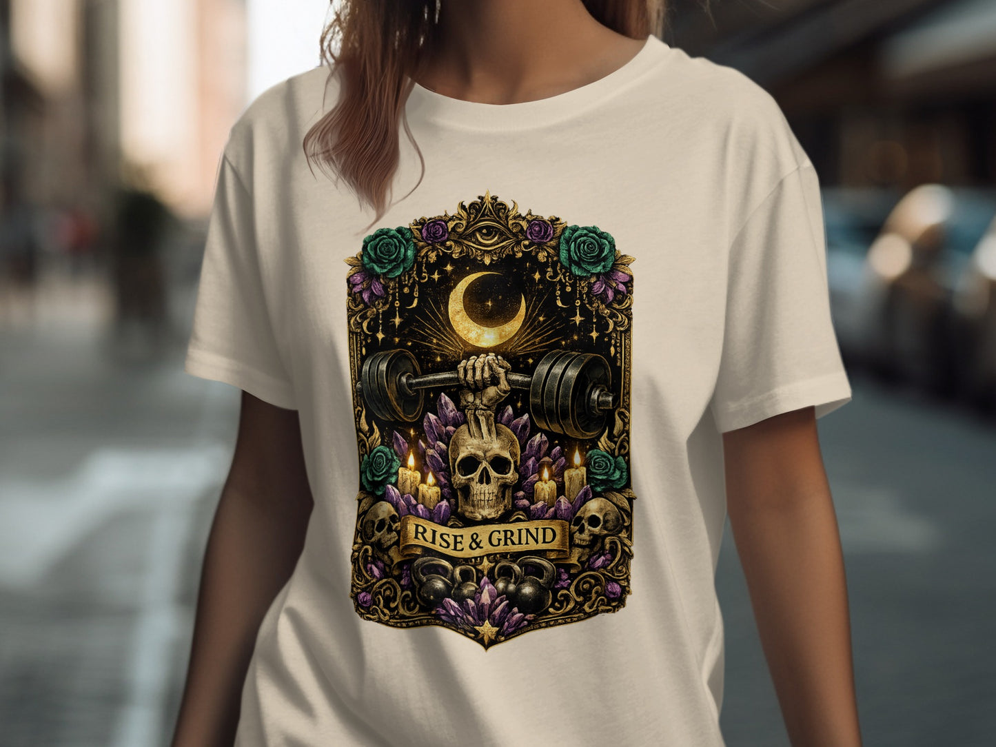 T-shirt with skull, barbell, crescent moon, crystals, and roses.