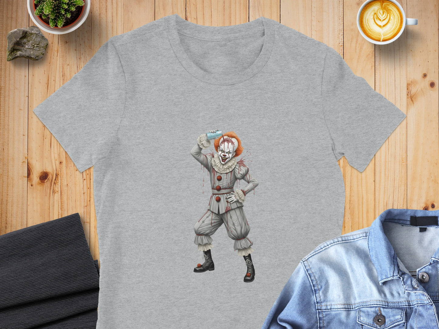 Gray t-shirt featuring a detailed illustration of a menacing clown with white face paint.