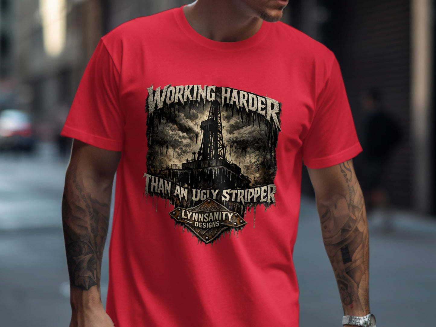 Red t-shirt with distressed graphic "WORKING HARDER THAN AN UGLY STRIPPER".