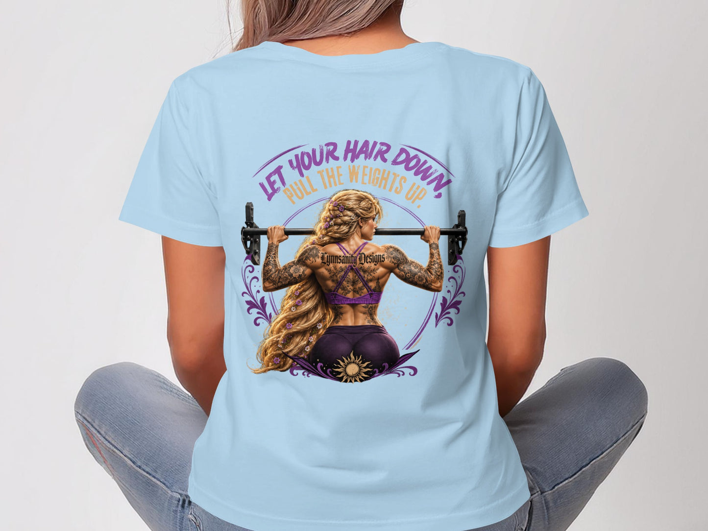Woman with tattoos and long blonde hair lifting weights, text "Let your hair down, pull the weights up."