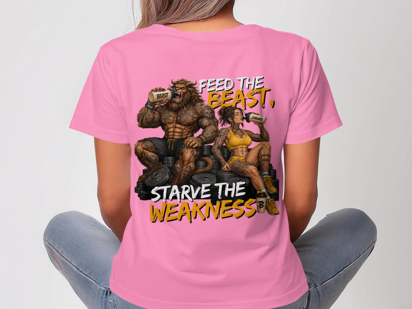 Pink t-shirt with "Feed the Beast, Starve the Weakness" and beastly figures.