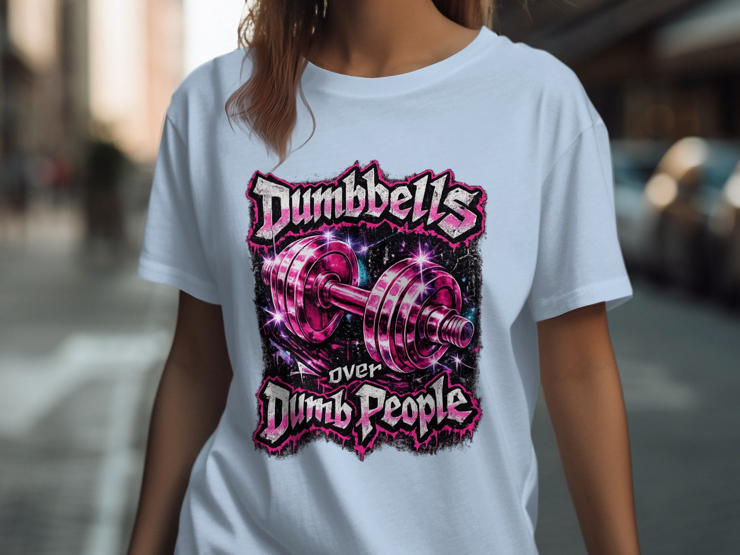 Light blue t-shirt with "Dumbbells Over Dumb People" text and a pink dumbbell graphic.