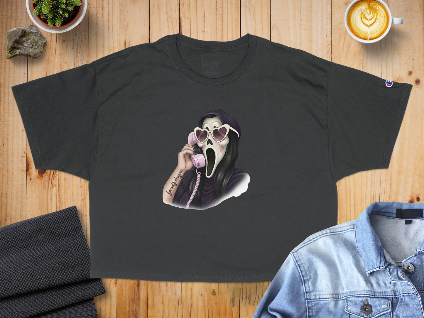 Ghostface character in heart-shaped sunglasses on a black t-shirt.