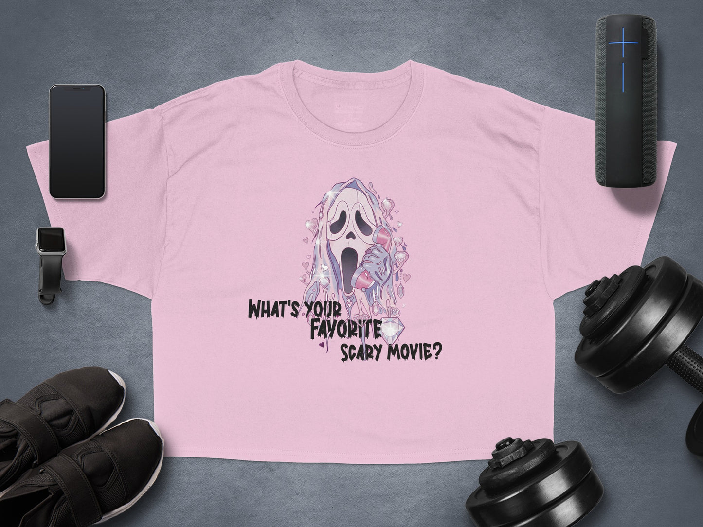 Pink t-shirt with Ghostface asking "What's your favorite scary movie?"