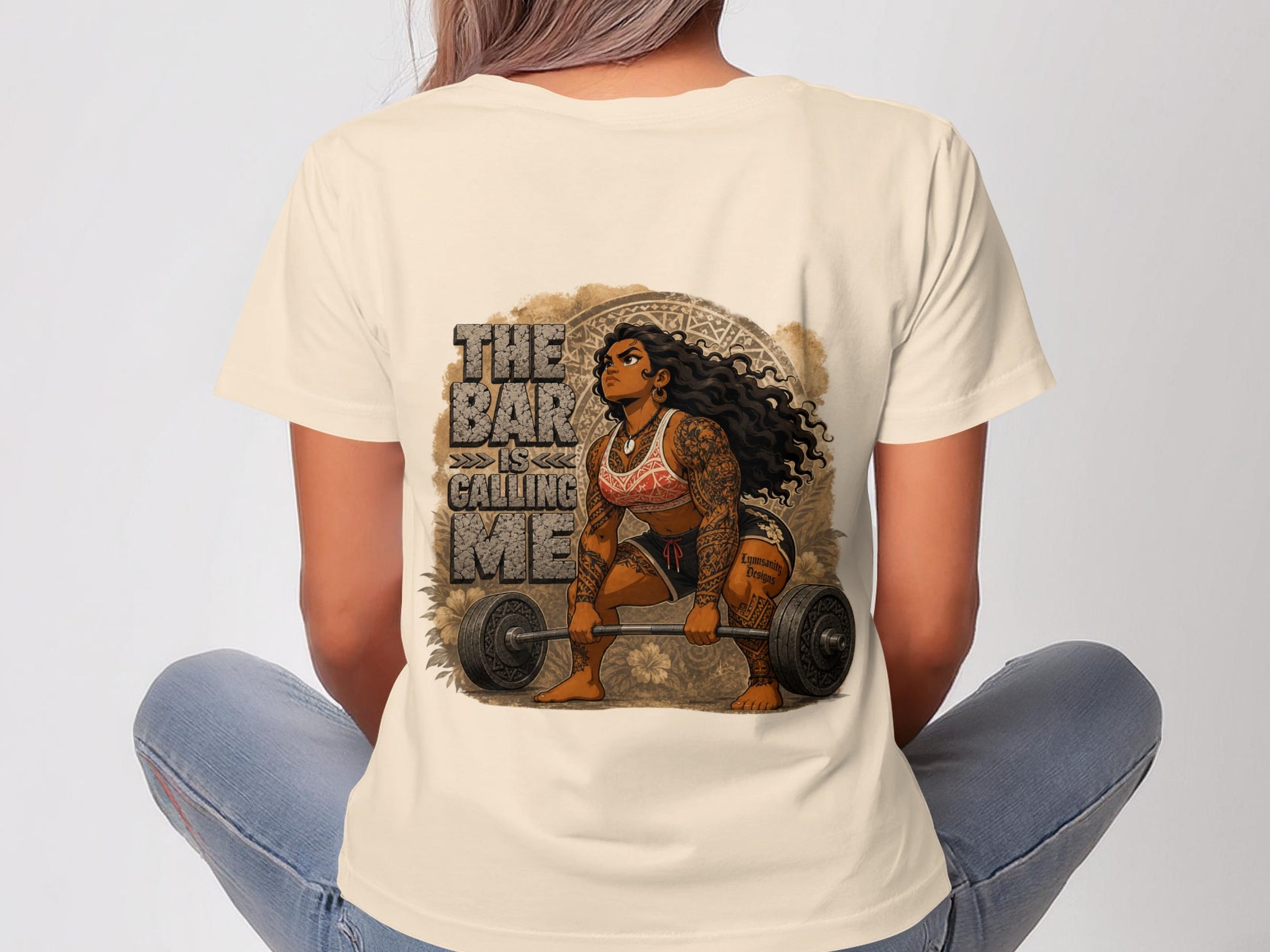 Woman in tan t-shirt lifting weights with text "The Bar Is Calling Me."