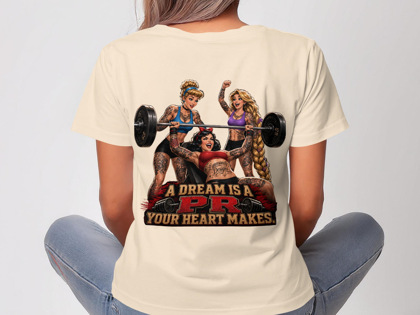 Three women lifting weights with text "A dream is a PR your heart makes."