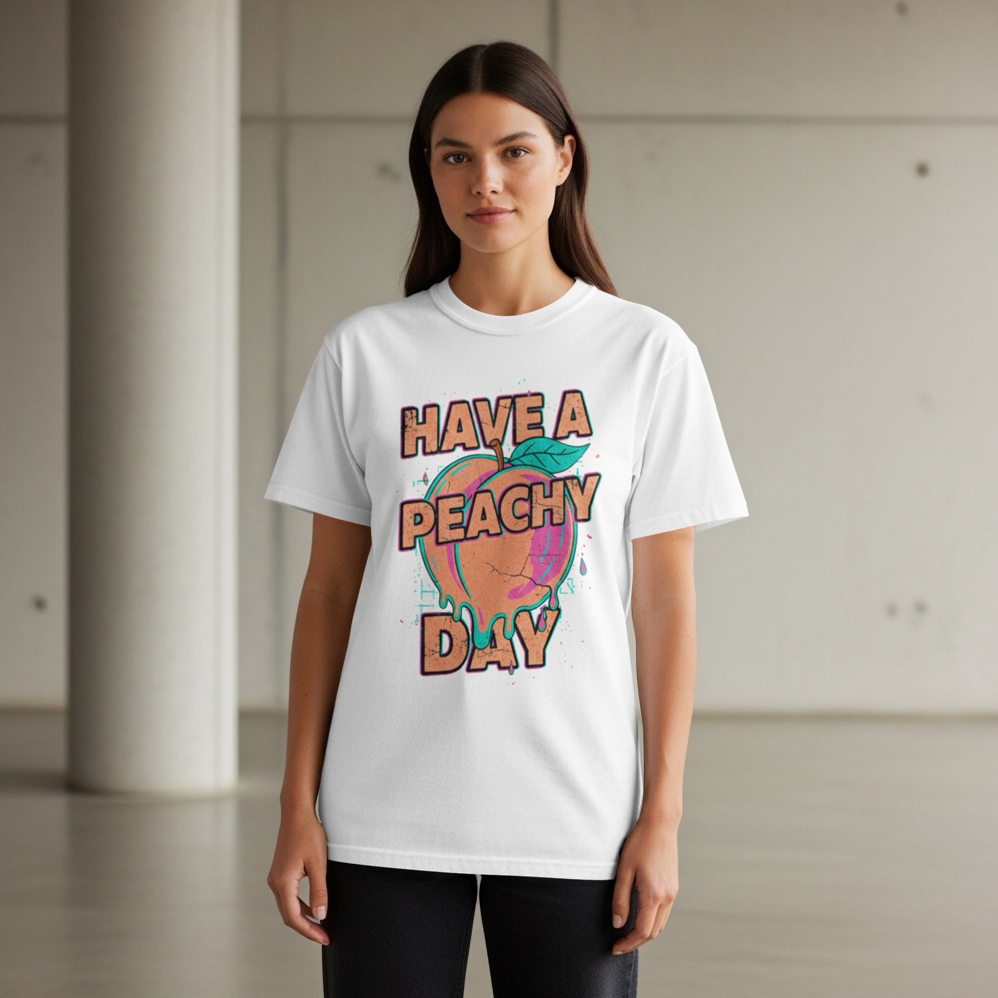 White t-shirt with "HAVE A PEACHY DAY" text and a graphic peach.