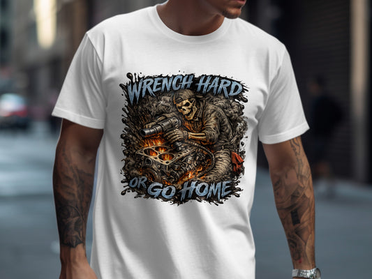 White t-shirt with graphic of a skeleton working on an engine, "Wrench Hard Or Go Home" text.