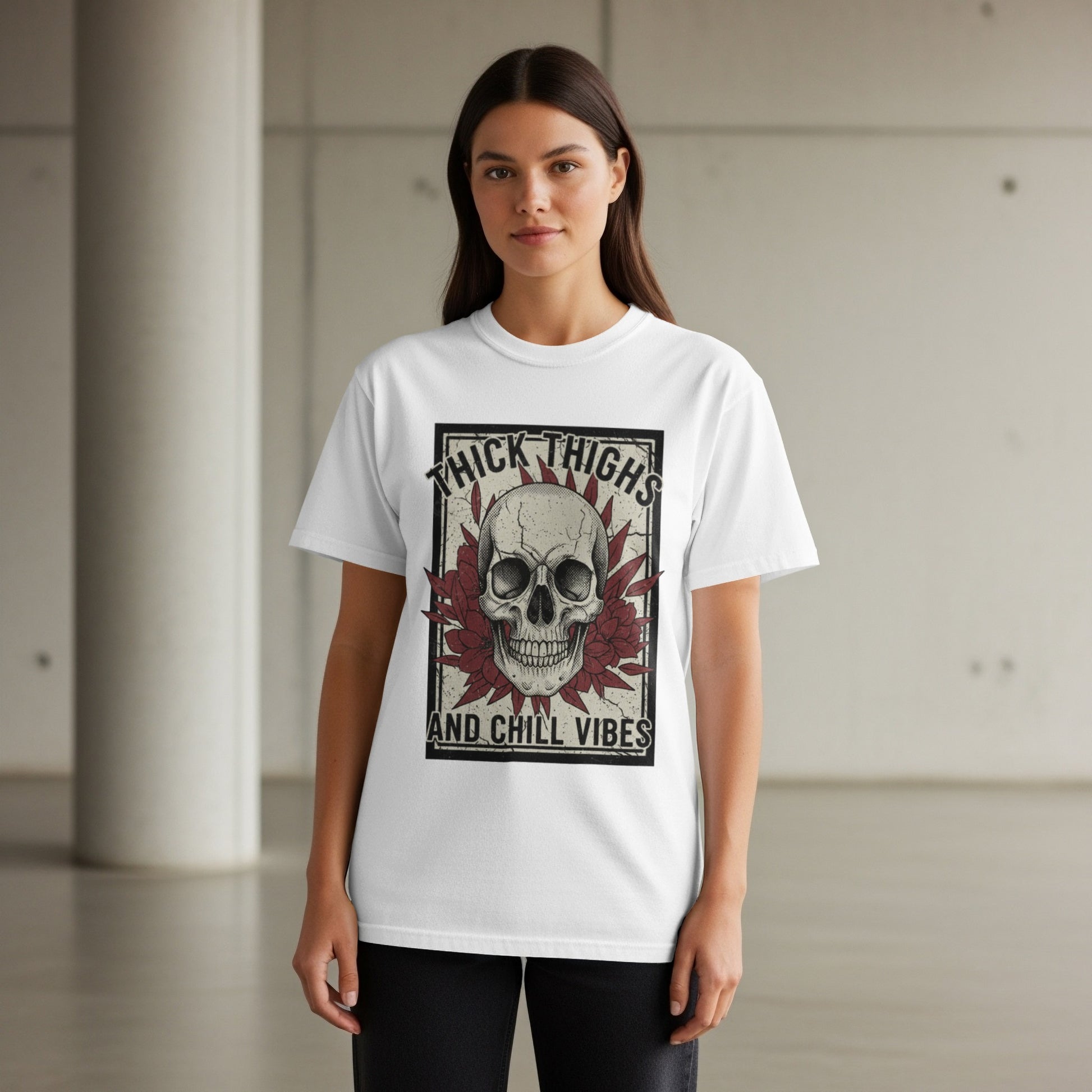 White t-shirt with skull, roses, and text "THICK THIGHS AND CHILL VIBES".