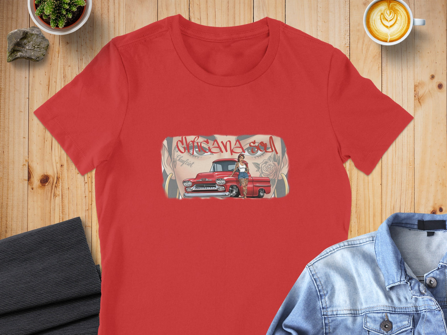 Red t-shirt with graphic of woman and classic red pickup truck.