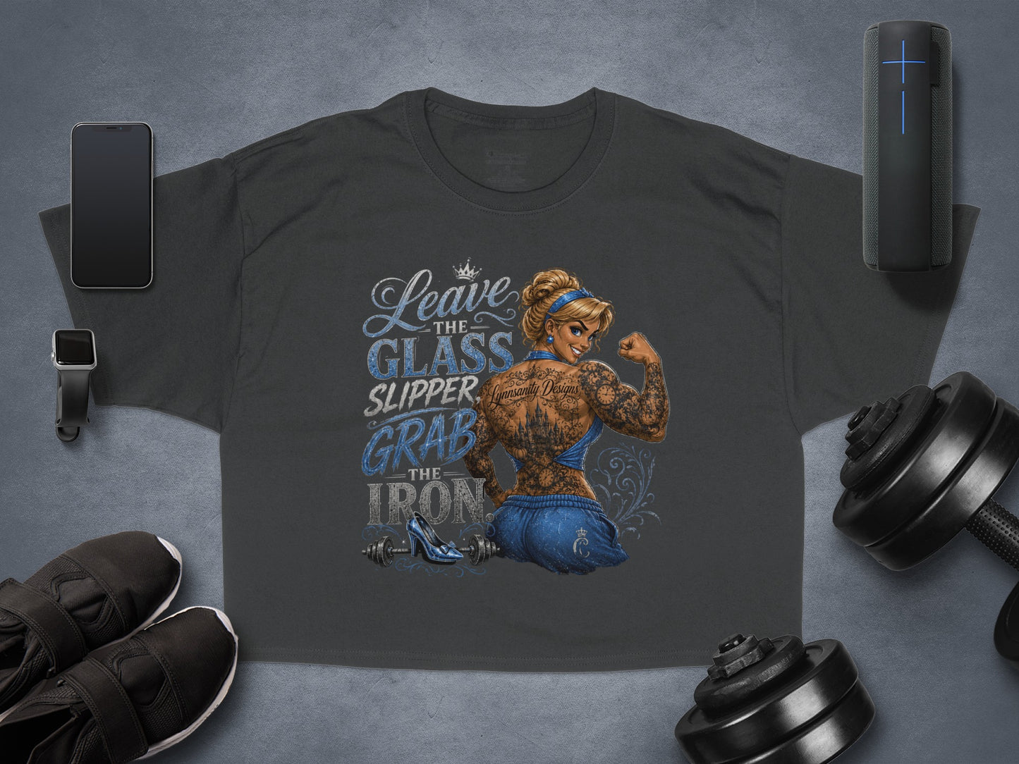 Dark gray t-shirt with "Leave the glass slipper, grab the iron" and muscular Cinderella graphic.