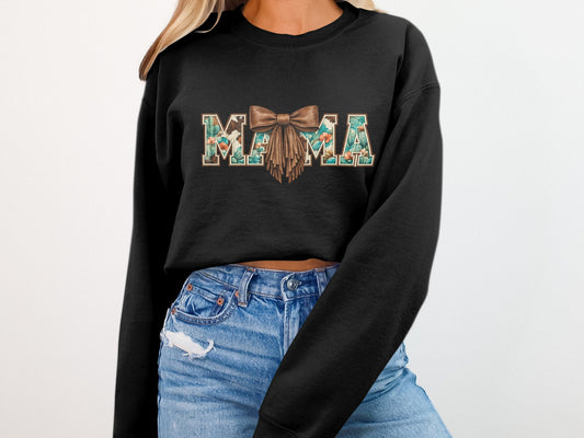 Black crewneck sweatshirt with "MAMA" text in a floral and cactus pattern.