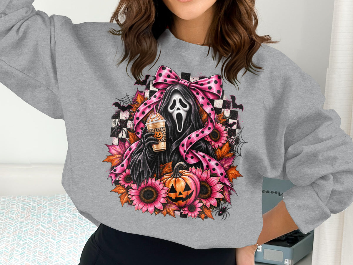 Ghostface with coffee cup, pumpkin, sunflowers, and pink polka dot bow on sweatshirt.