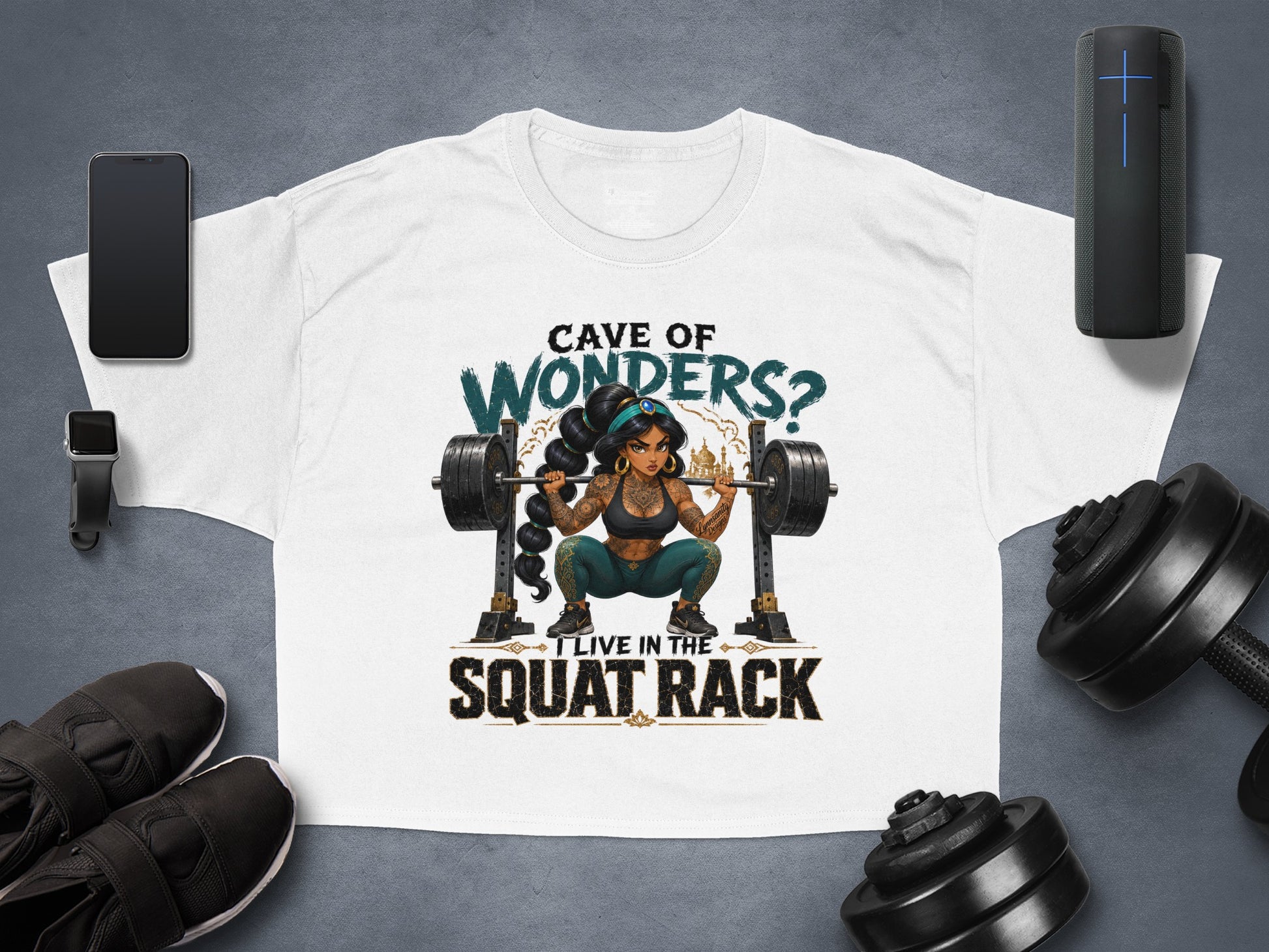 T-shirt with woman lifting barbell, text "Cave of? I live in the squat rack."