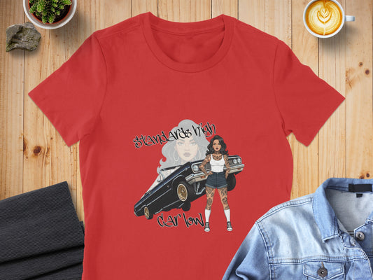 Red t-shirt featuring a woman with tattoos and a classic car, "Standards High, Car Low".