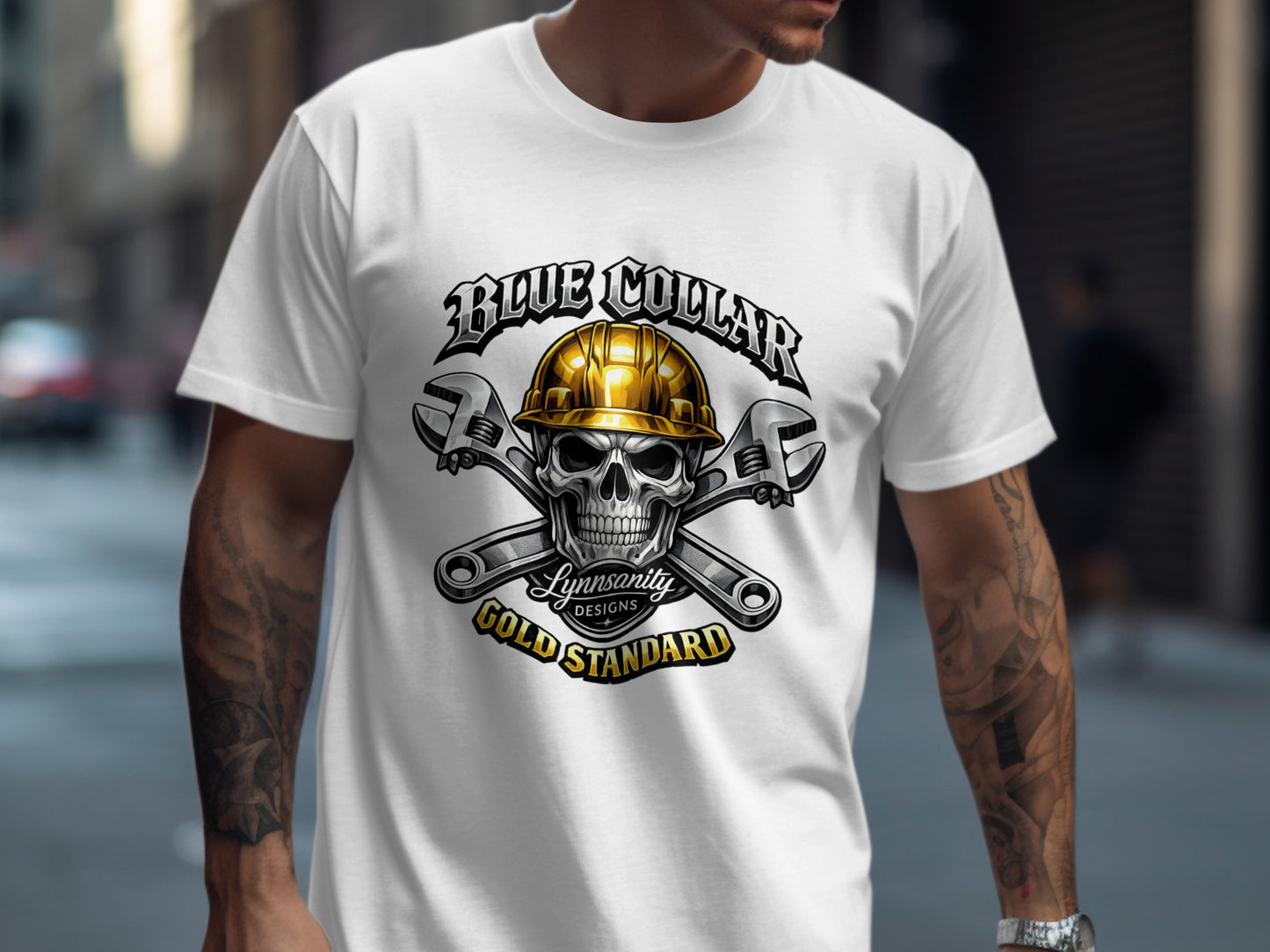 Skull with wrenches and "Blue Collar Gold Standard" logo on white t-shirt.