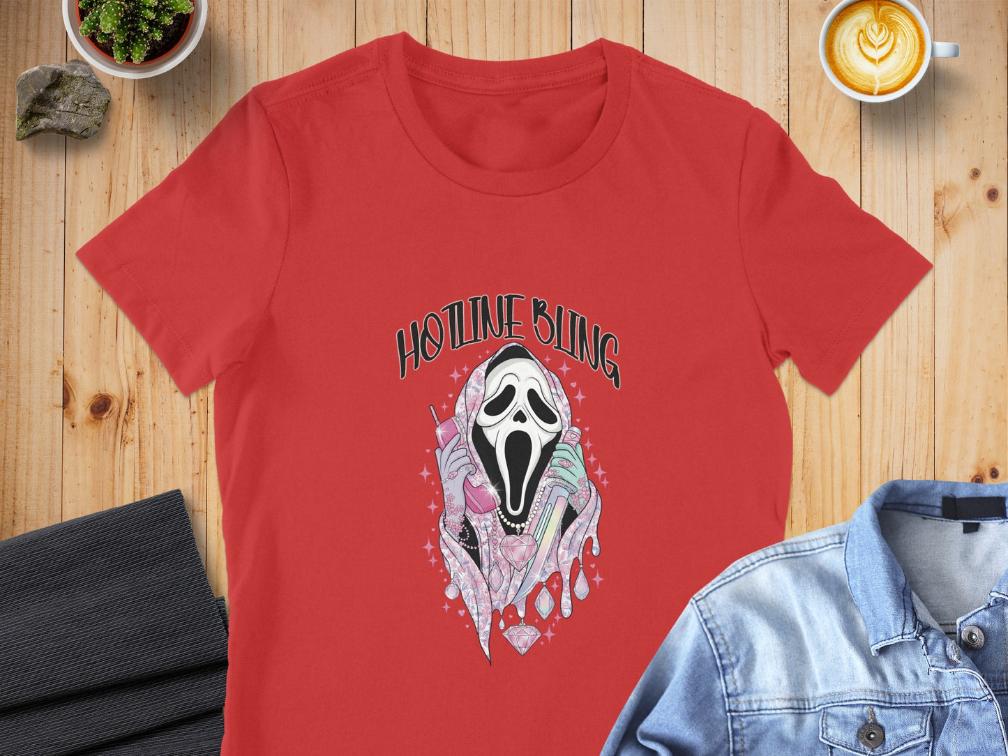 Red t-shirt with ghost graphic saying "Hotline Bling" holding a phone.