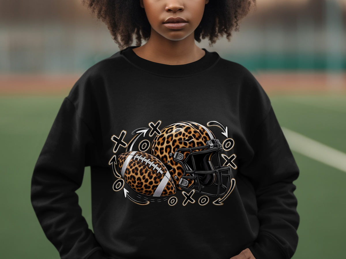 Black sweatshirt with leopard print football, helmet, and Xs and Os design.