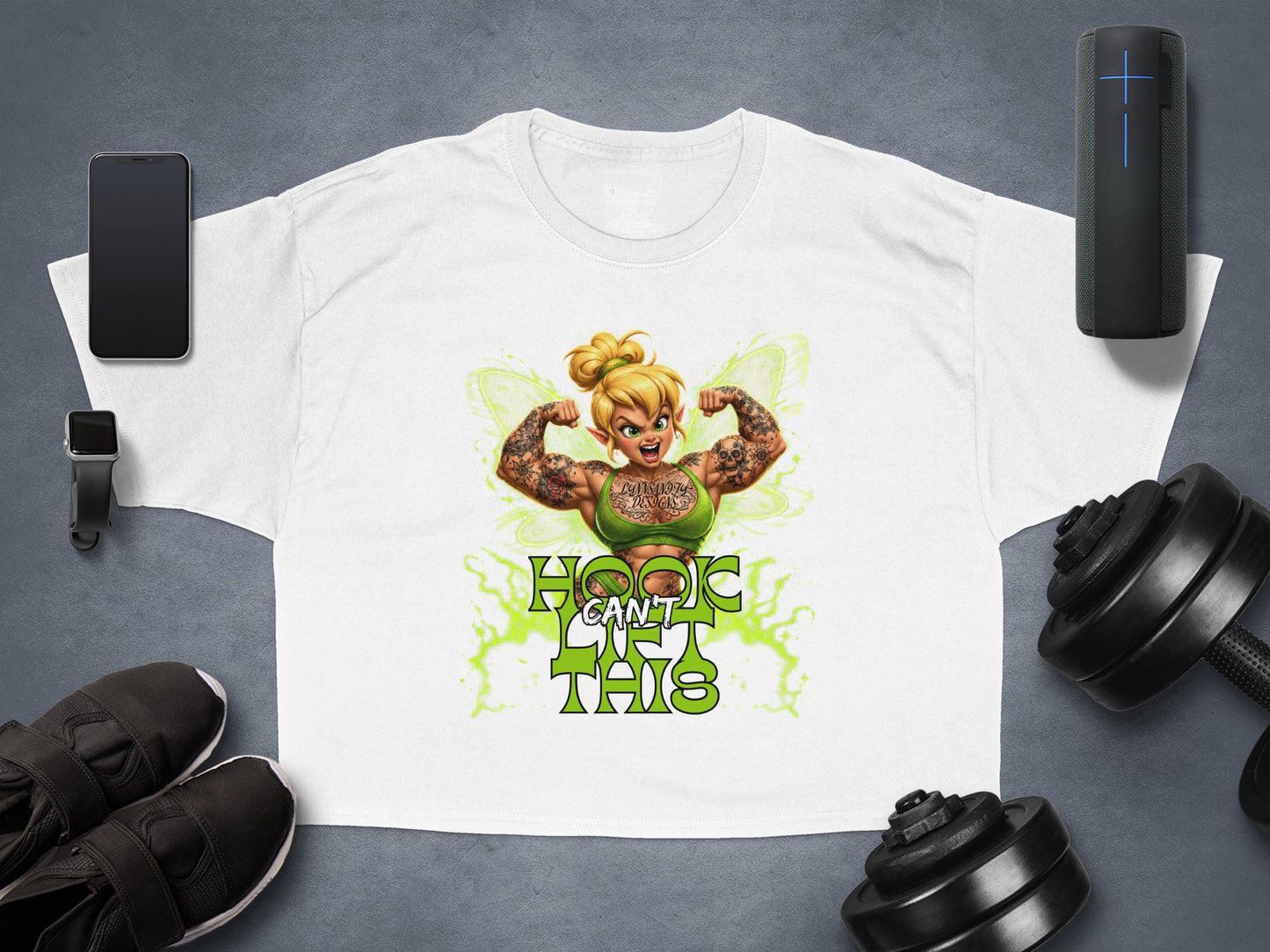 White crop t-shirt featuring a muscular fairy tattoo design and "I CAN'T THIS" text.