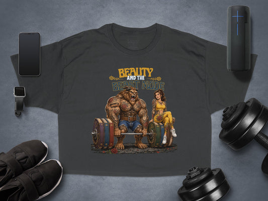 T-shirt featuring Beauty and the Beast characters with weights.