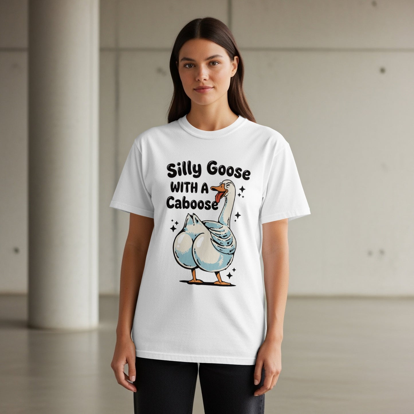 White t-shirt with a cartoon goose and the text "Silly Goose With A Caboose".