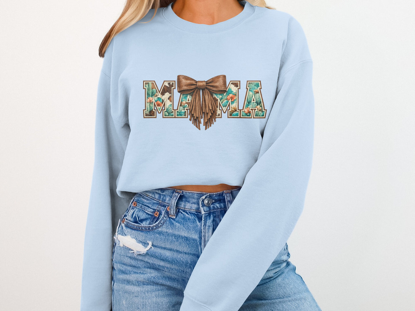 Light blue crewneck sweatshirt with "MAMA" text in floral and cactus pattern.