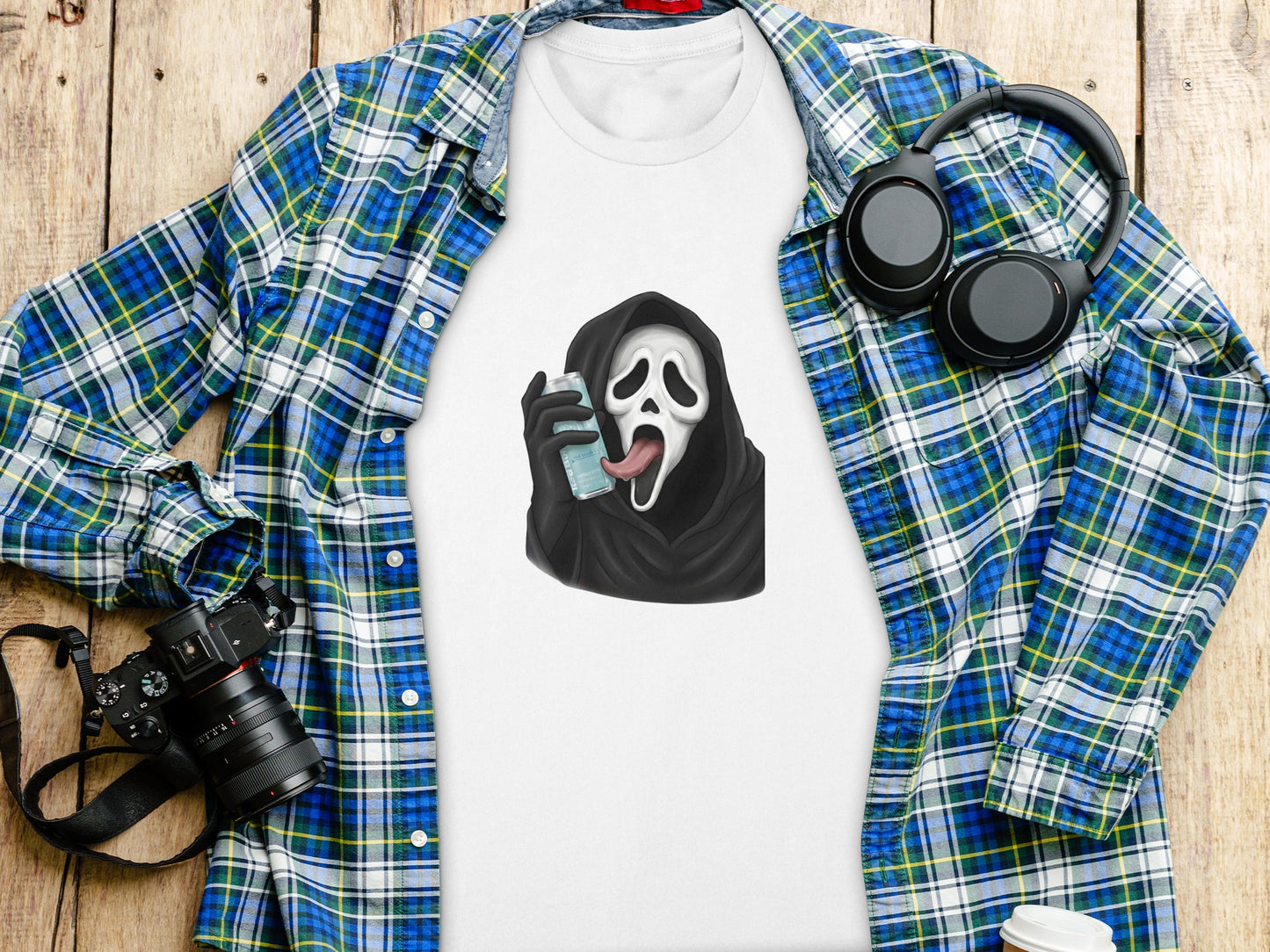 Ghostface mask character on white t-shirt with plaid shirt and headphones.