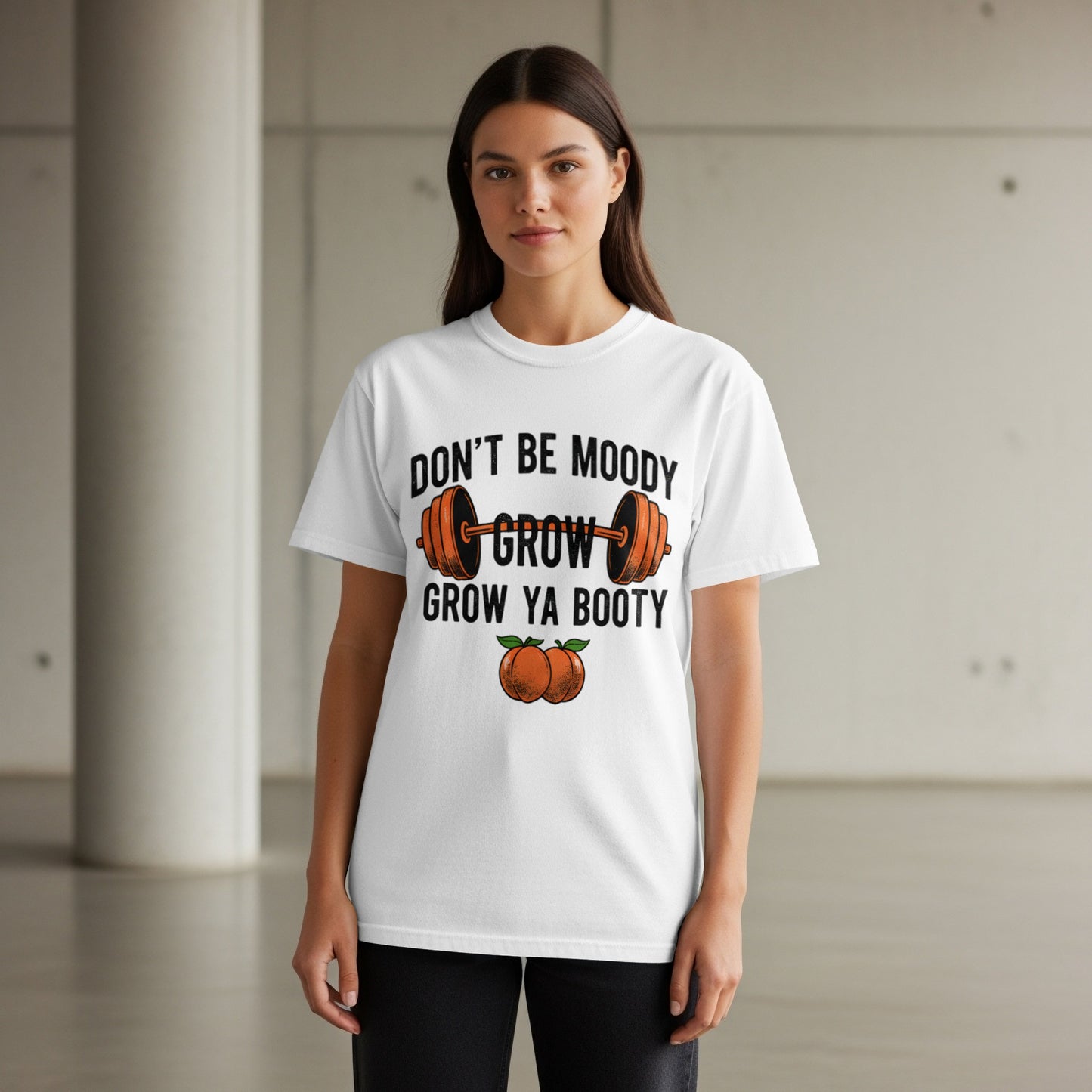 White t-shirt with "Don't Be Moody Grow Ya Booty" and barbell graphic.