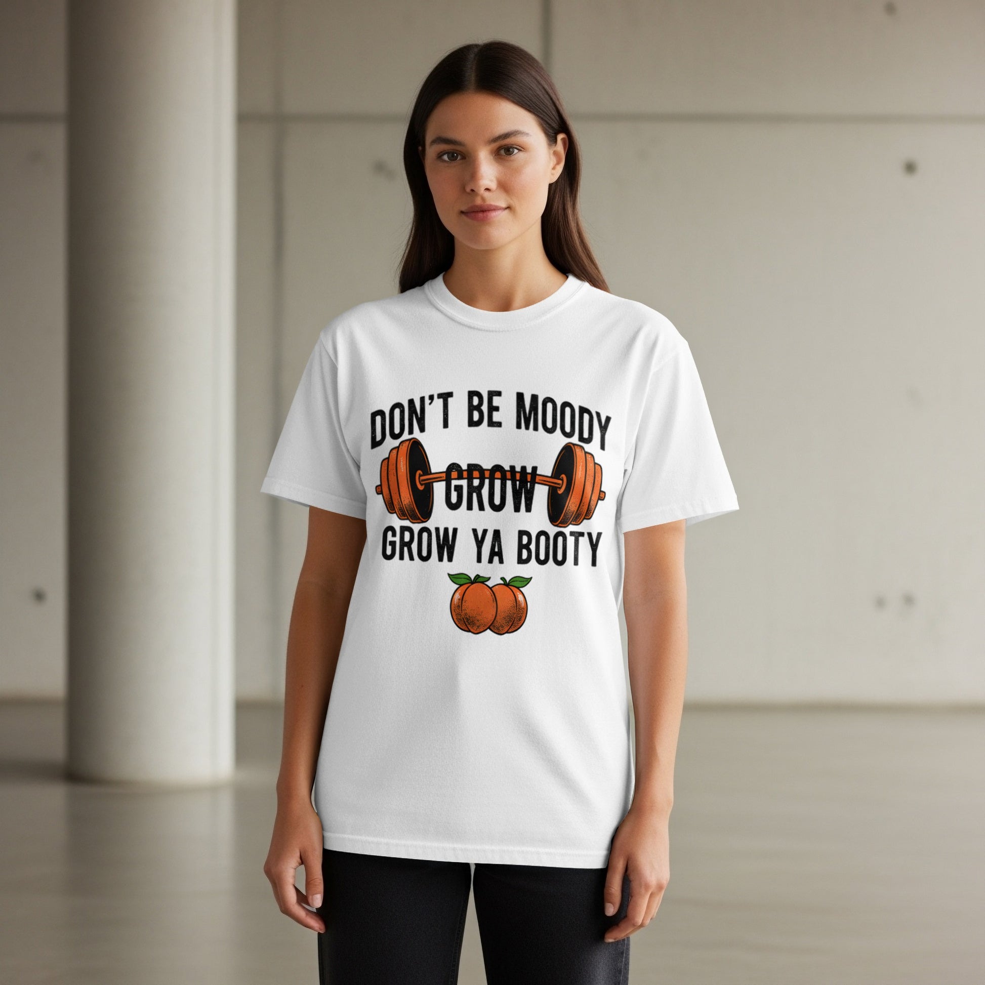White t-shirt with "Don't Be Moody Grow Ya Booty" and barbell graphic.