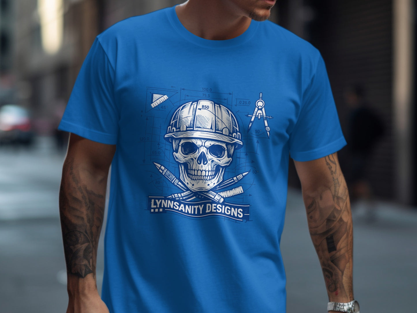 Blue t-shirt featuring a skull, crossed wrenches, and compass over LYNNSANITY DESIGNS logo.
