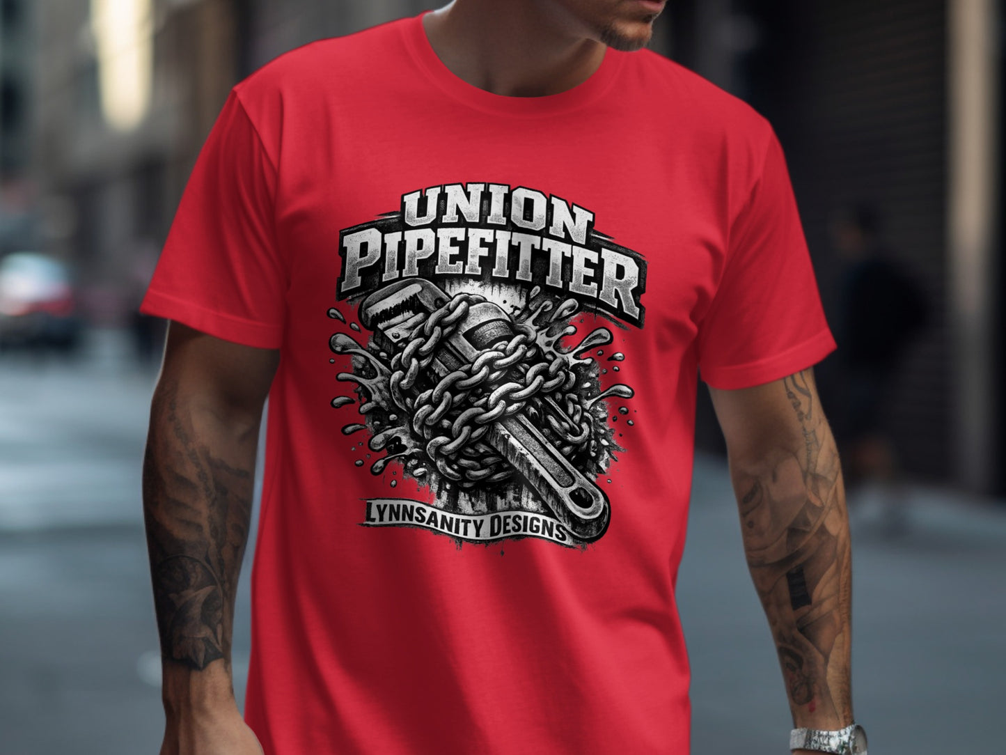 Red t-shirt with chained pipe wrench and "Union Pipefitter" text.