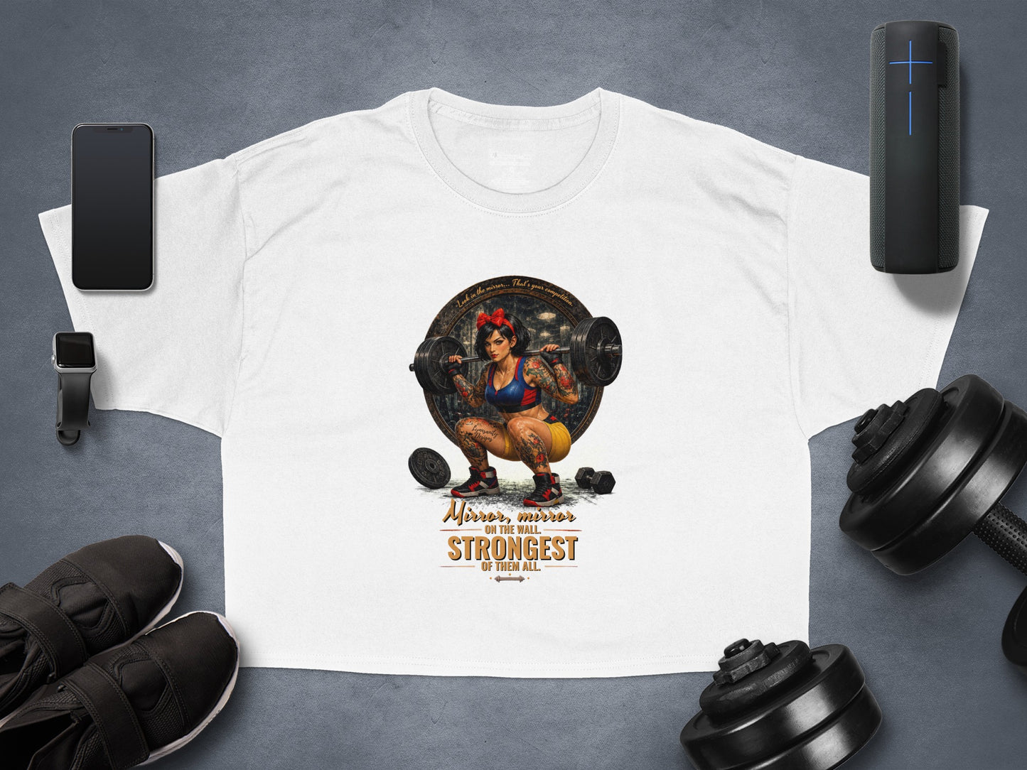 White t-shirt with "Mirror, mirror ON THE WALL. STRONGEST OF THEM ALL." text and graphic.
