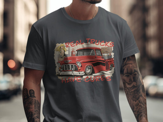 Red vintage truck with "Real Trucks Have Curves" text on a gray t-shirt.
