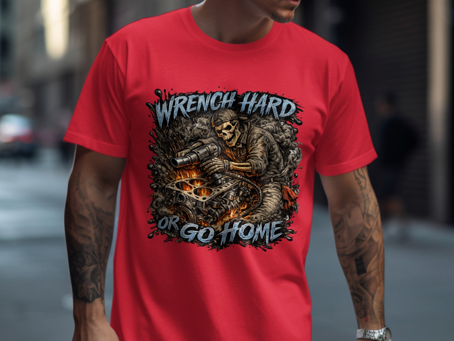 Red t-shirt with "Wrench Hard or Go Home" skull mechanic graphic.