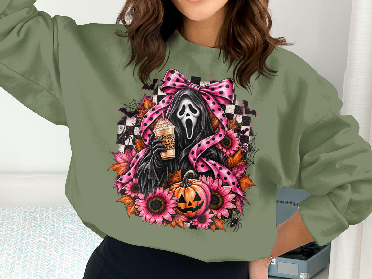 Halloween graphic with ghost, pumpkin, sunflowers, and polka dot bow.