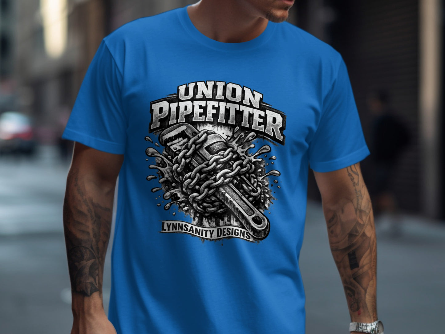 Union Pipefitter t-shirt with wrench, chains, and water splashes.