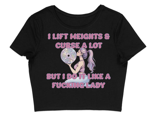 Black crop top with "I lift weights & curse a lot but I do it like a fucking lady" graphic.