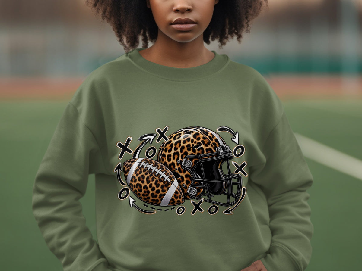 Green sweatshirt with leopard print football helmet, football, and X and O graphics.