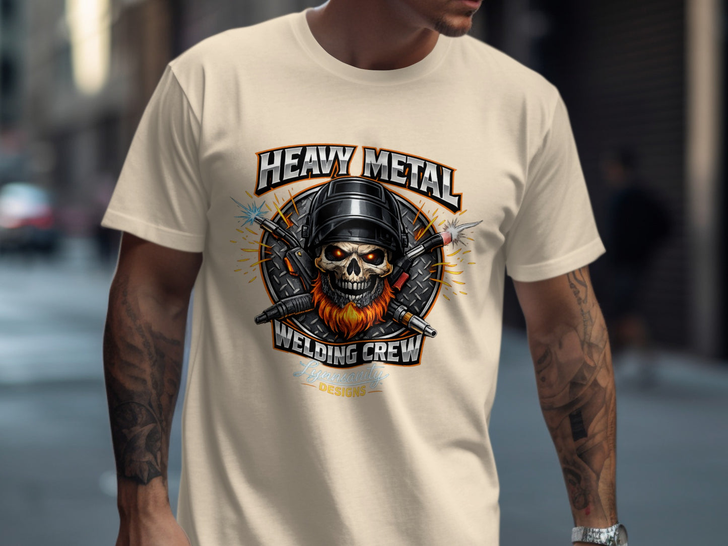 T-shirt design: skull welding helmets, sparks, and "Heavy Metal Welding Crew" text.