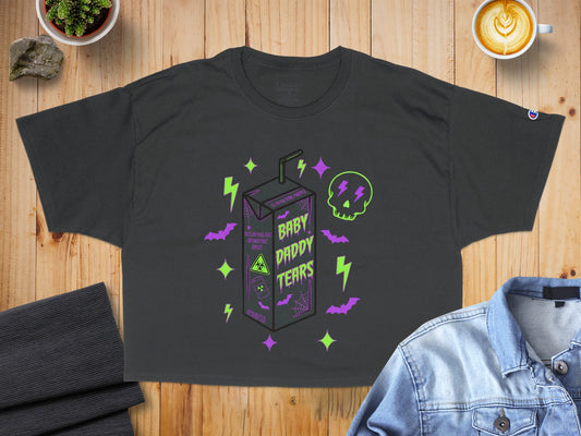 Dark t-shirt with "Baby Daddy Tears" graphic and purple lightning bolts.
